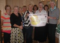 The Lions Ladies presenting the £250 to Hospiscare